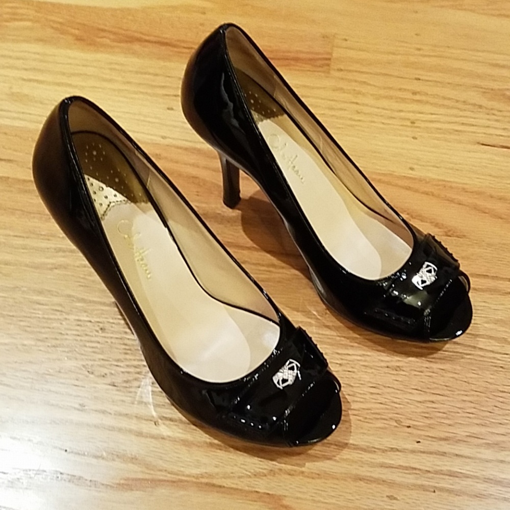 Black patent leather Cole Haan pumps